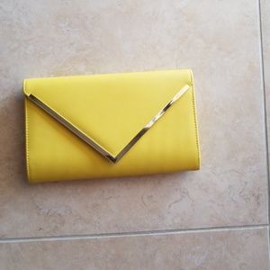 Oversized Aldo yellow envelope clutch